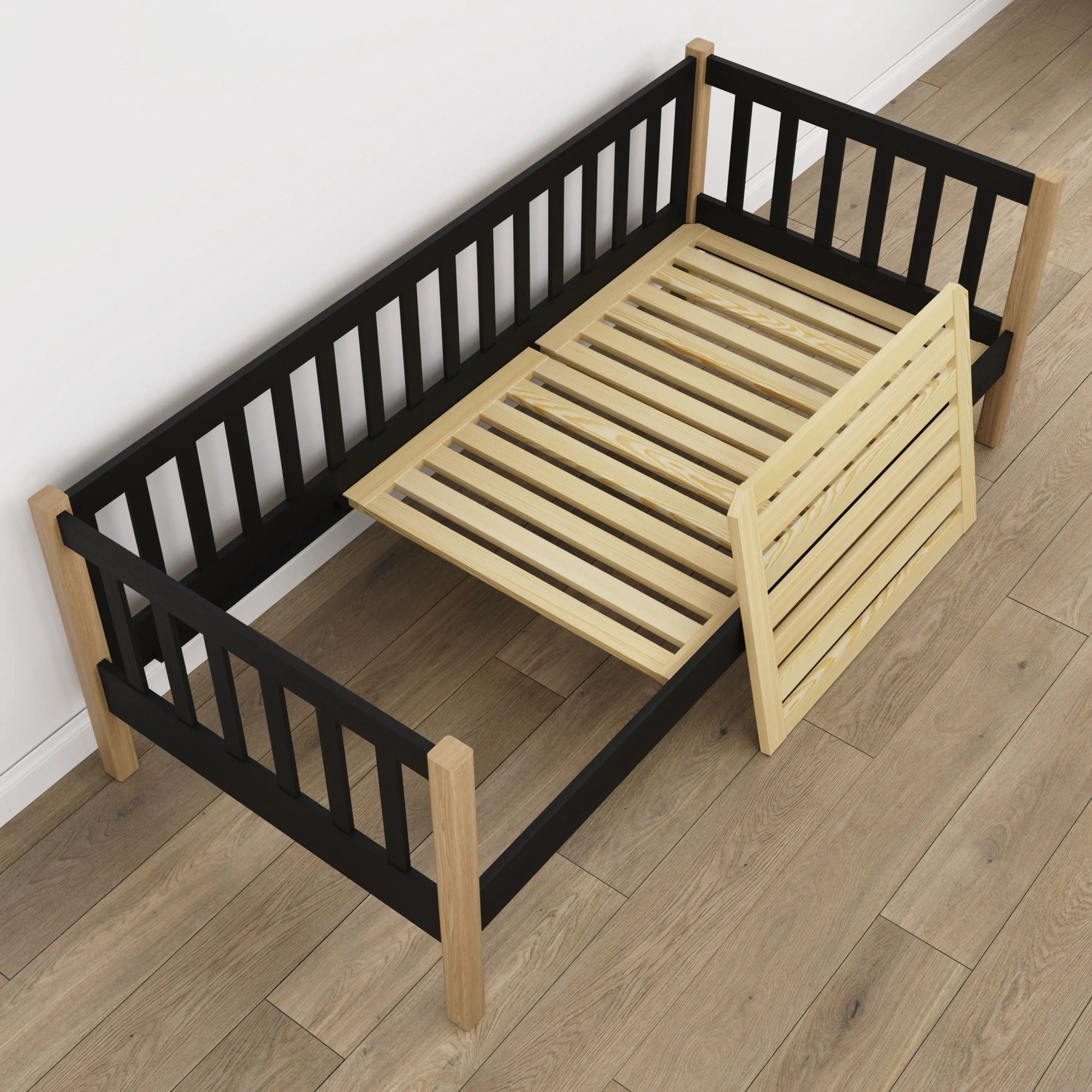 Sofa bed wooden black with oak – angled view, Scandinavian style